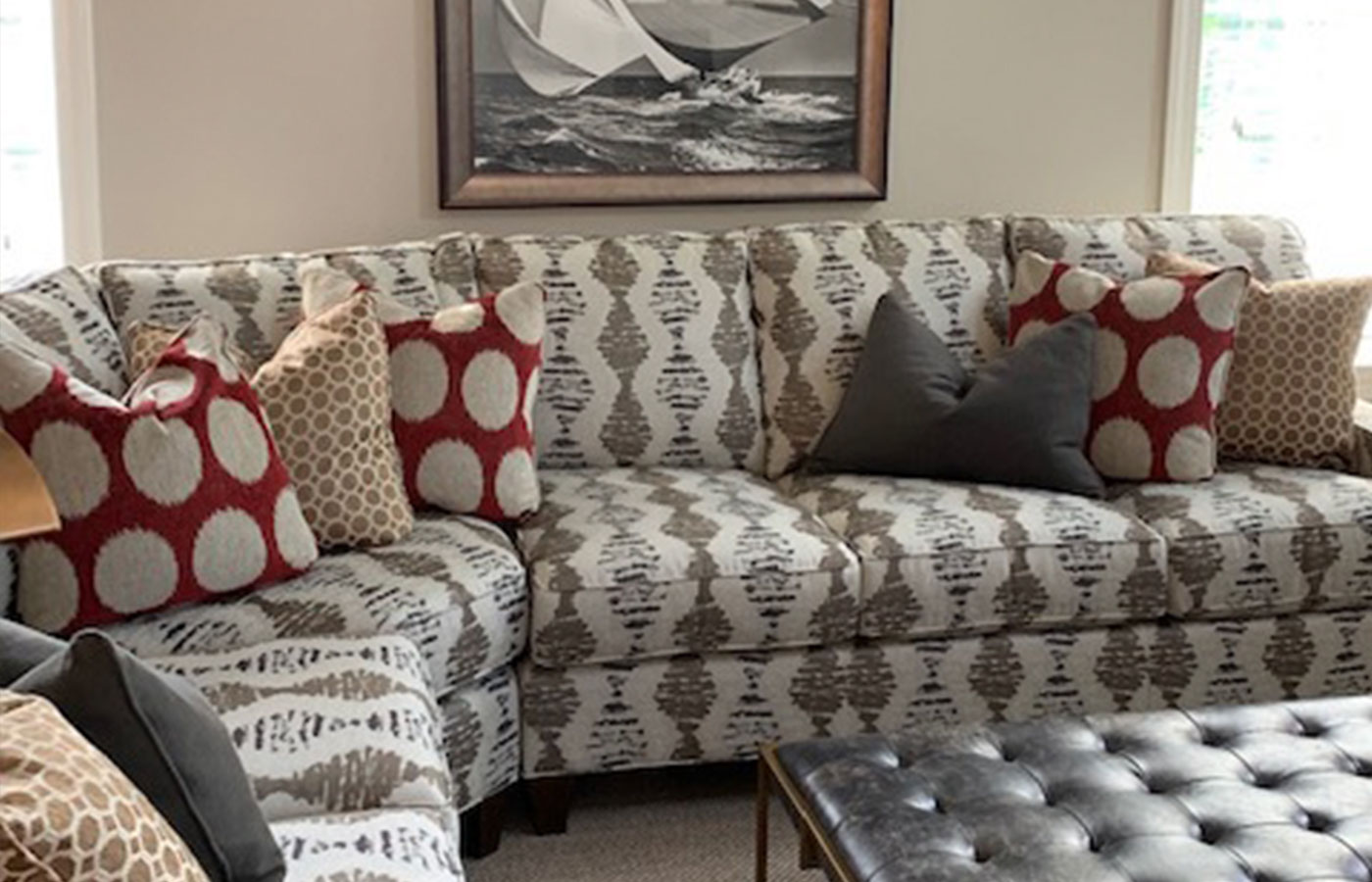 modern sectional with patterned fabric and pillows