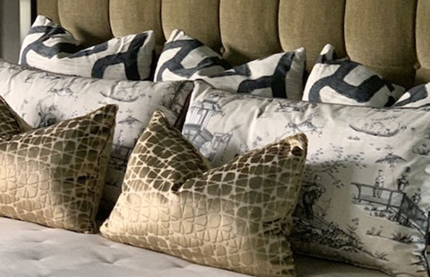 decorative pillows on modern bedding