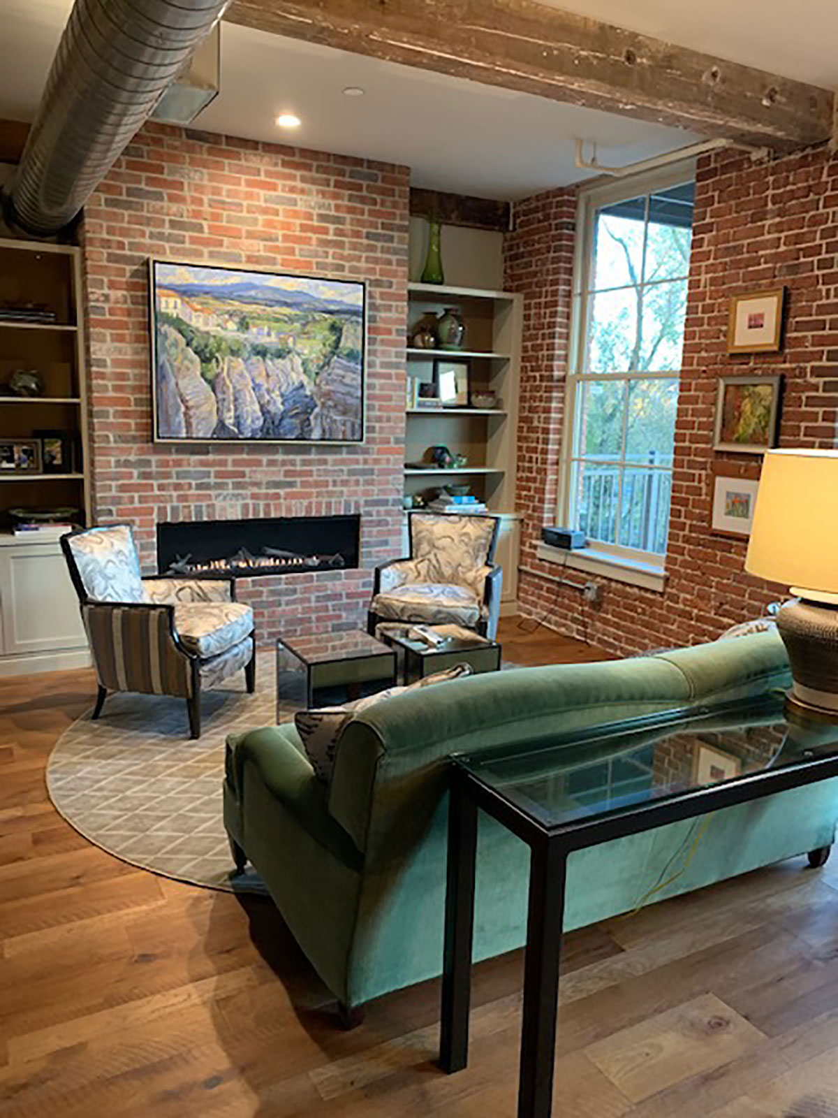 classic seating area with sleek, modern fireplace